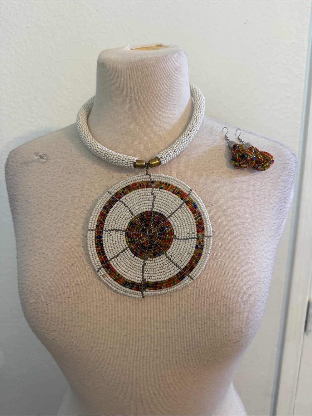 Handcrafted White Beaded Statement Necklace and earrings with Multicolor Pendant